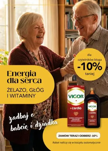 Tańcząca, radosna starsza para w domu. Baner Vigor Cardio Tonik z żelazem na krew i energię – promocja na Dzień Babci i Dziadka.